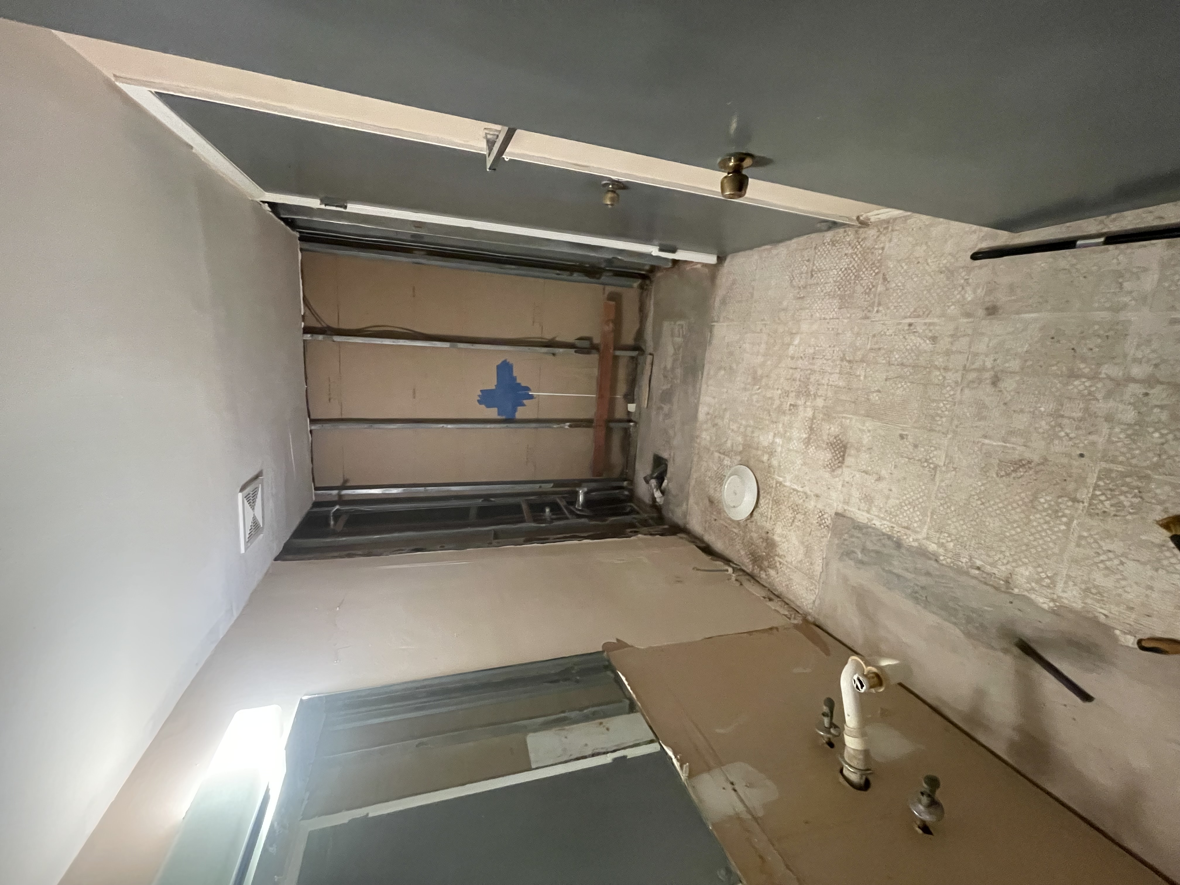 Bathroom renovation demolition and construction progress
