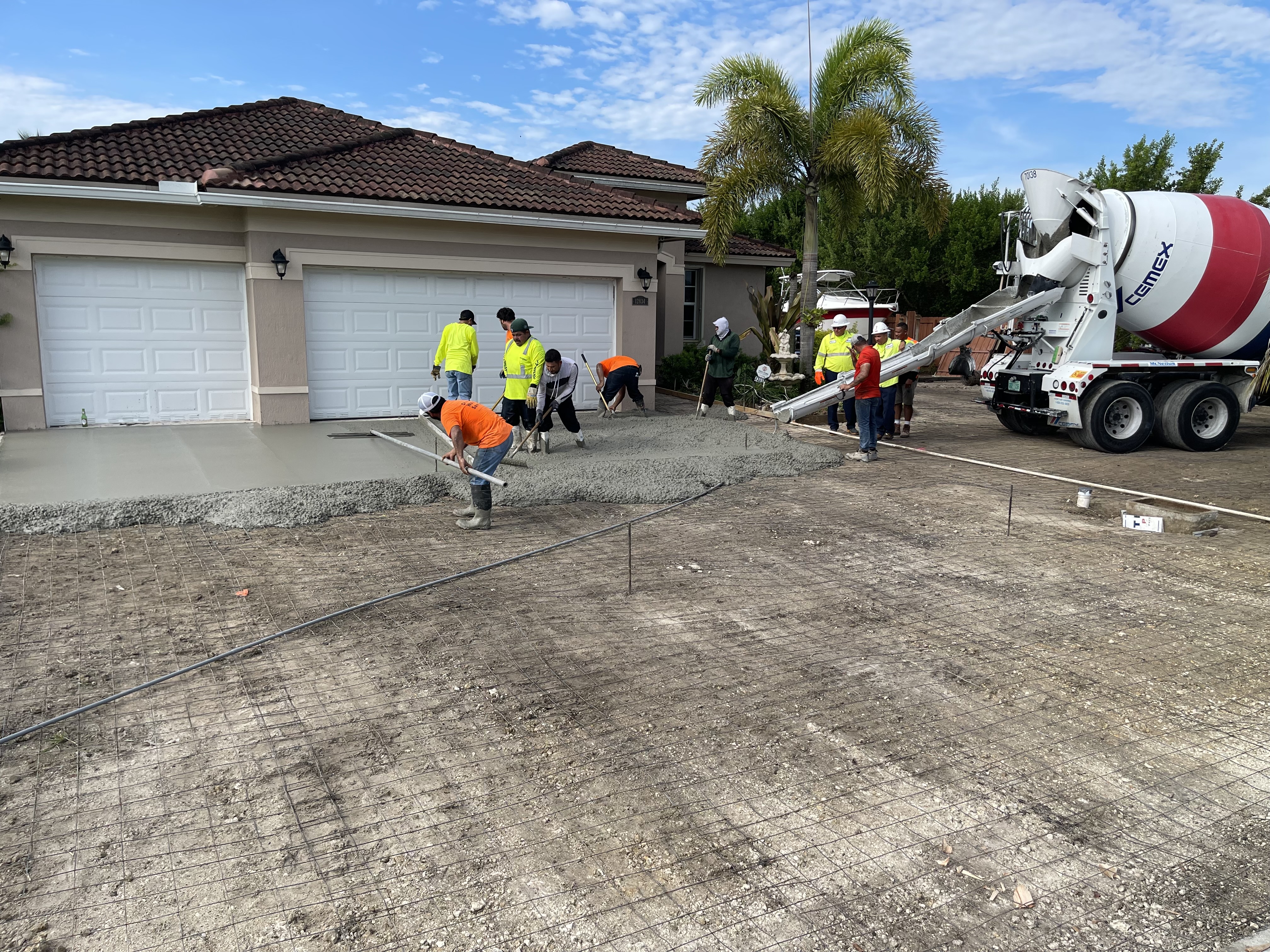 Concrete being poured for new driveway