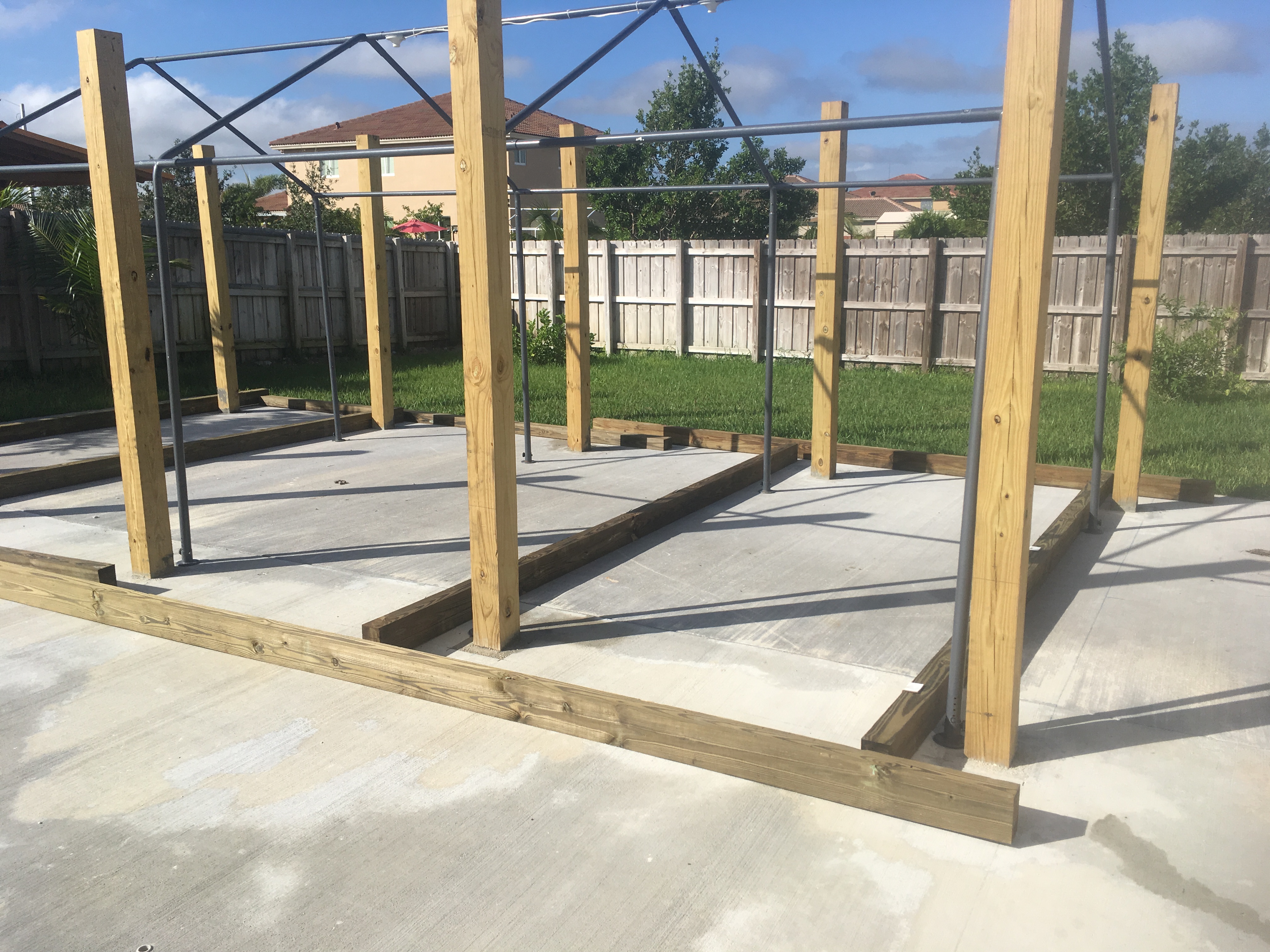 Gazebo construction with structural posts and beams