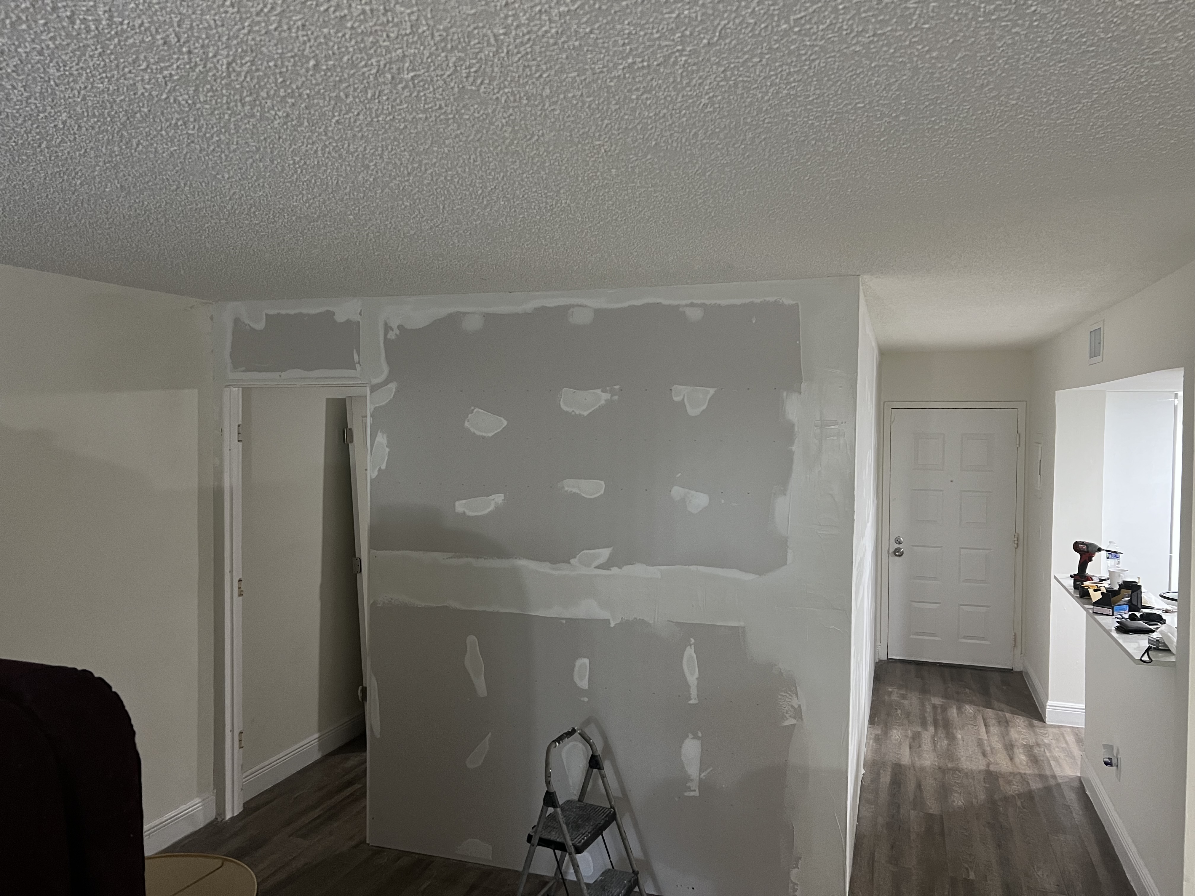 Drywall finishing and doorway construction